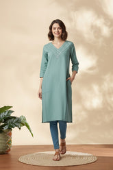 Solid Green Cotton Kurta with Pocket – Women’s Wear